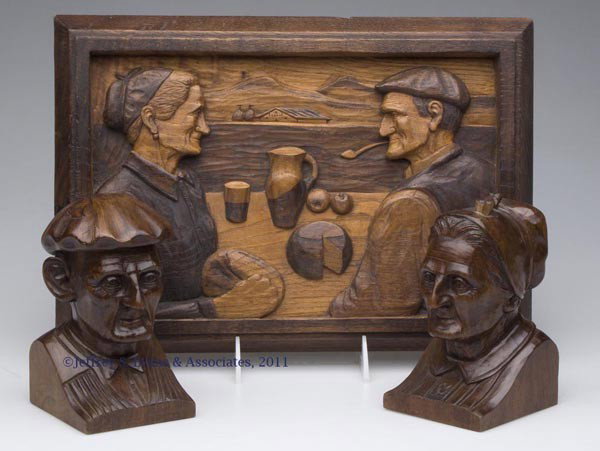 THREE HARDWOOD CARVINGS: THREE HARDWOOD CARVINGS, comprising a two-tone plaque and a pair of bookends signed J. Alberdi. 20th century. 10" x 14" and 6" H. Provenance: From a Shenandoah Valley private collection.