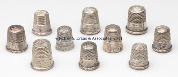 SIMONS BROTHERS STERLING SILVER SCENIC THIMBLES, L: SIMONS BROTHERS STERLING SILVER SCENIC THIMBLES, LOT OF TEN, various chased and engraved landscapes. Each with maker's mark in apex, three with monograms. Late 19th/early 20th century. 9/16" to 15/16"