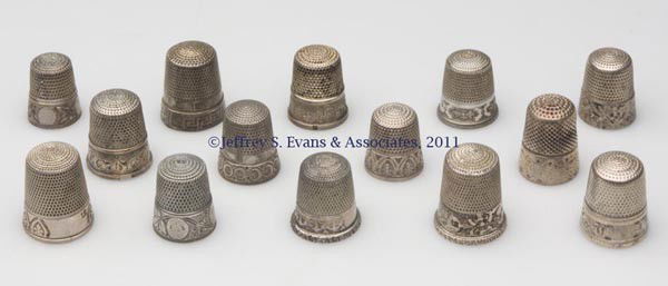 SIMONS BROTHERS STERLING SILVER THIMBLES, LOT OF 1: SIMONS BROTHERS STERLING SILVER THIMBLES, LOT OF 14, various chased, engraved, and rolled floral and geometrical patterns, including a Walls of Troy/Greek Key, and one example with worn "SOUVENIR". Ea
