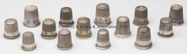 SIMONS BROTHERS STERLING SILVER THIMBLES, LOT OF 1: SIMONS BROTHERS STERLING SILVER THIMBLES, LOT OF 14, utilitarian and various scroll patterns, including Faceted Rim; French Knurl; Wave Scroll; and Repeating Scrolls. Each with maker's mark in apex, o