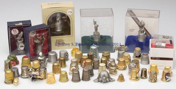 VARIOUS METALS THIMBLES, LOT OF 56: VARIOUS METALS THIMBLES, LOT OF 56, including novelty examples. 20th century. Various sizes. Provenance: Collection of the late Fern I. Hill.