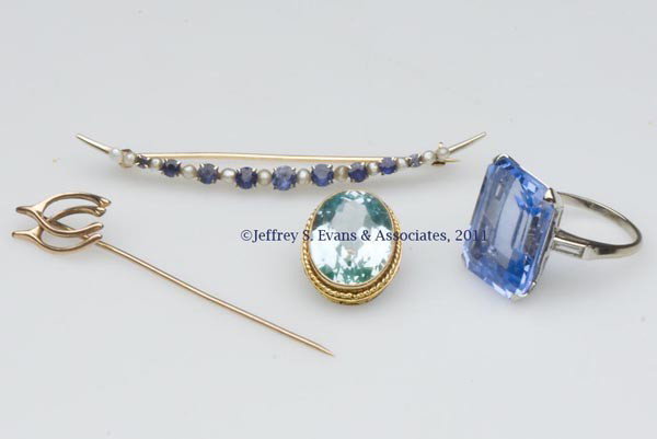 ASSORTED LOT OF VINTAGE AND CONTEMPORARY JEWELRY, : ASSORTED LOT OF VINTAGE AND CONTEMPORARY JEWELRY, LOT OF FOUR, comprising marked 14k white-gold crescent pin set with spinels and pearls, a white-gold ring with emerald-cut tanzanite, a double-wishbon