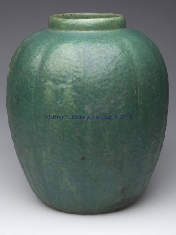 FULPER MELON-FORM ART POTTERY VASE: FULPER MELON-FORM ART POTTERY VASE, cucumber matte glaze, base with oblong raised maker's name. First quarter 20th century. 14" H, 11" DOA, 7 1/4" D base. Provenance: From a New York estate.