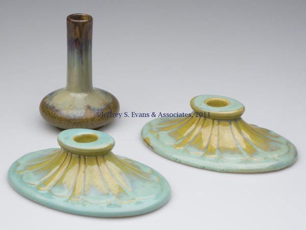 FULPER ART POTTERY ARTICLES, LOT OF THREE: FULPER ART POTTERY ARTICLES, LOT OF THREE, various glazes, comprising a pair of candleholders and a stick vase, each signed. First half 20th century. 2" H, 4 3/4" x 7 1/4", and 5 1/4" H, 3 1/2" DOA.