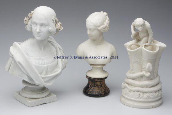 PARIAN CERAMIC ARTICLES, LOT OF THREE: PARIAN CERAMIC ARTICLES, LOT OF THREE, white, comprising a bust of Jenny Lind, on square base with name, an unidentified bust on plinth, with separate wooden base, and a vase featuring a monkey sittin
