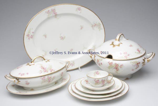 JEAN POUYAT LIMOGES DINNERWARE, LOT OF 77 PIECES: JEAN POUYAT LIMOGES DINNERWARE, LOT OF 77 PIECES, white ground with pink roses and white daisies, gilt decoration, comprising twelve 9 3/4" dinner plates; twelve 8 5/8" luncheon plates; twelve 7 5/8" 