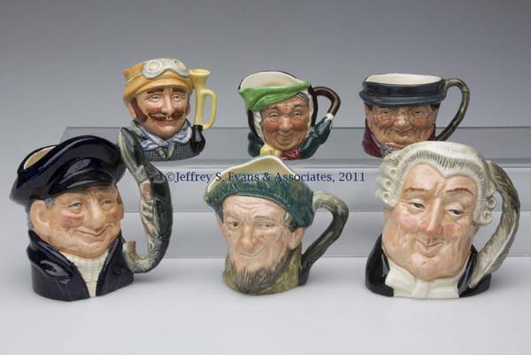 ROYAL DOULTON CHARACTER JUGS, LOT OF SIX: ROYAL DOULTON CHARACTER JUGS, LOT OF SIX, comprised of "The Lawyer", No. D6504; "Lobster Man", No. D6620; "Auld Mac", No. D5824; "Veteran Motorist", No. D6641; "Tony Weller" with embossed name to reve