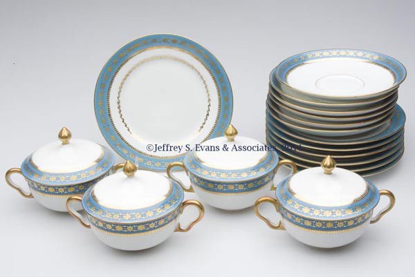 LIMOGES CHINA BOUILLON SET: LIMOGES CHINA BOUILLON SET, deep robin's egg blue with gilt decoration, comprising four covered bouillon cups, six saucers and seven 6 1/8" D. plates, each marked "CA (entwined)/ France". Charles Aren
