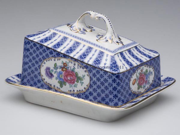 BOOTHS SILICON CHINA "EMPIRE" CHEESE DISH: BOOTHS SILICON CHINA "EMPIRE" CHEESE DISH, blue and white with each side containing a cartouche with floral polychrome decoration, gilt decoration, underside with maker's mark and slightly illegible "