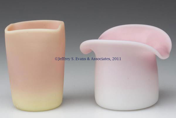 VARIOUS ART GLASS TOOTHPICK HOLDERS, LOT OF TWO: VARIOUS ART GLASS TOOTHPICK HOLDERS, LOT OF TWO, comprised of a satin/plush finish Burmese square form with ground pontil mark; and a satin/plush finish Peach Blow hat form with partially polished pon