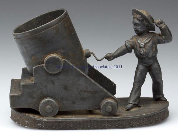 REED & BARTON SILVER-PLATE FIGURAL TOOTHPICK /MATC: REED & BARTON SILVER-PLATE FIGURAL TOOTHPICK /MATCH HOLDER, soldier with cannon, maker's mark on base. Late 19th/early 20th century. 3 1/2" HOA. Provenance: From the collection of Edward N. Cooke.