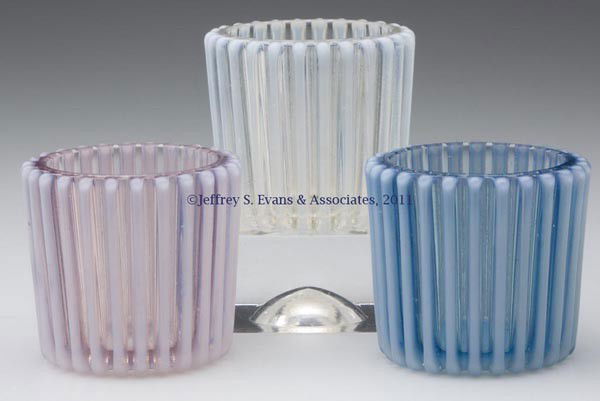 BEATTY RIB TOOTHPICK HOLDERS, LOT OF THREE: BEATTY RIB TOOTHPICK HOLDERS, LOT OF THREE, blue, colorless, and a lavender tinted opalescent. A. J. Beatty & Sons. Fourth quarter 19th century. 1 7/8" H. Provenance: From the collection of Edward N.