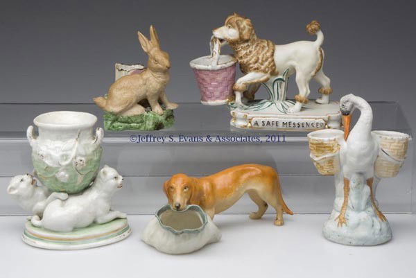 BISQUE AND CERAMIC FIGURAL ANIMAL TOOTHPICK / MATC: BISQUE AND CERAMIC FIGURAL ANIMAL TOOTHPICK / MATCH HOLDERS, LOT OF FIVE, comprised of two dogs, including a hound dog and other embossed on base "A SAFE MESSENGER"; a rabbit; cats playing group with
