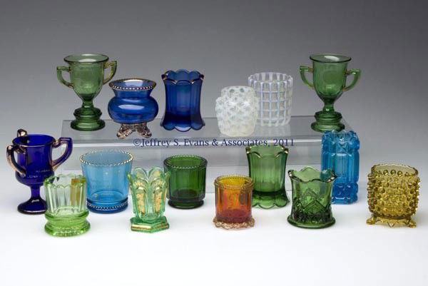 VARIOUS PATTERNS COLORED GLASS TOOTHPICK HOLDERS,: VARIOUS PATTERNS COLORED GLASS TOOTHPICK HOLDERS, LOT OF 16, various colors, nine examples with worn gilt decoration, comprised of a colorless opalescent Beatty Waffle and Paneled Sprig; four with sou