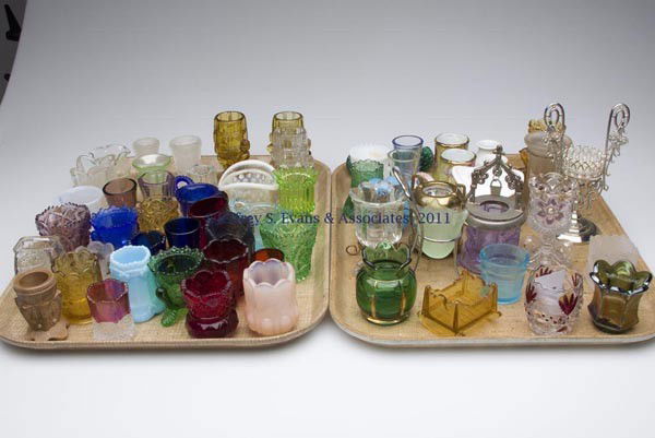 VARIOUS GLASS AND CERAMIC TOOTHPICK HOLDERS, LOT O: VARIOUS GLASS AND CERAMIC TOOTHPICK HOLDERS, LOT OF 62, various colors, comprised of contemporary and period examples, including four ceramic five examples fitted in metal frames, and 14 figural examp