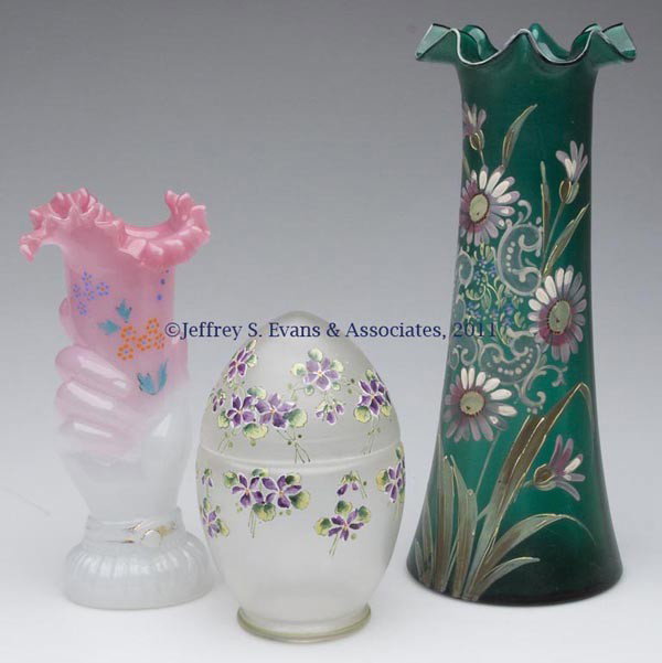 VICTORIAN GLASS ARTICLES, LOT OF THREE: VICTORIAN GLASS ARTICLES, LOT OF THREE, polychrome floral decoration, comprising a pink shading to white hand vase with crimped and tooled rim, a tapered green vase with tooled rim, and an egg-shaped 