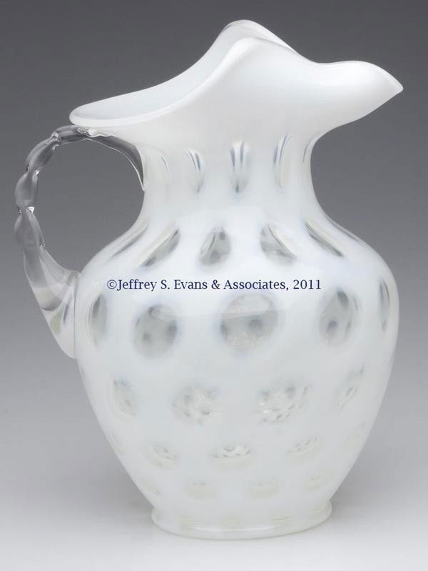 FENTON COIN DOT WATER PITCHER: FENTON COIN DOT WATER PITCHER, French opalescent, with ice lip and applied colorless twisted handle. Fenton Art Glass Co. 20th century. 9 1/2" HOA.
