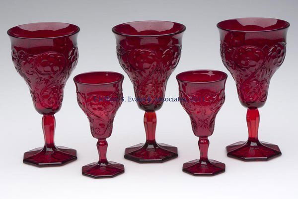 MCKEE ROCK CRYSTAL STEMS, LOT OF FIVE: MCKEE ROCK CRYSTAL STEMS, LOT OF FIVE, red, comprising three goblets and two wines. First half 20th century. 4 5/8" to 6 5/8" H. Provenance: From the collection of Edward N. Cooke.