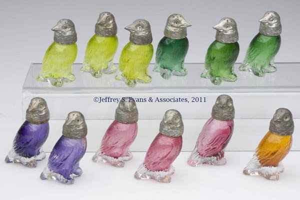GLASS FIGURAL BIRD SALT AND PEPPER SHAKERS, LOT OF: GLASS FIGURAL BIRD SALT AND PEPPER SHAKERS, LOT OF 12, amber, green, vaseline, cranberry, and plum, each with a metal shaker head and polished base. 20th century. 2 3/4" HOA. Provenance: From a New Yo