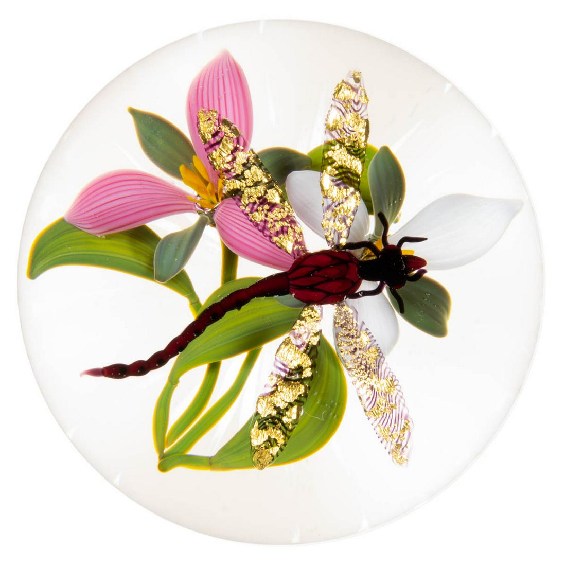 GORDON SMITH (AMERICAN, B. 1959) DRAGONFLY AND TRILLIUM LAMPWORK STUDIO ART GLASS PAPERWEIGHT: GORDON SMITH (AMERICAN, B. 1959) DRAGONFLY AND TRILLIUM LAMPWORK STUDIO ART GLASS PAPERWEIGHT, compound example, having a central ruby and black dragonfly with dichroic wings with gold foil, flying ov