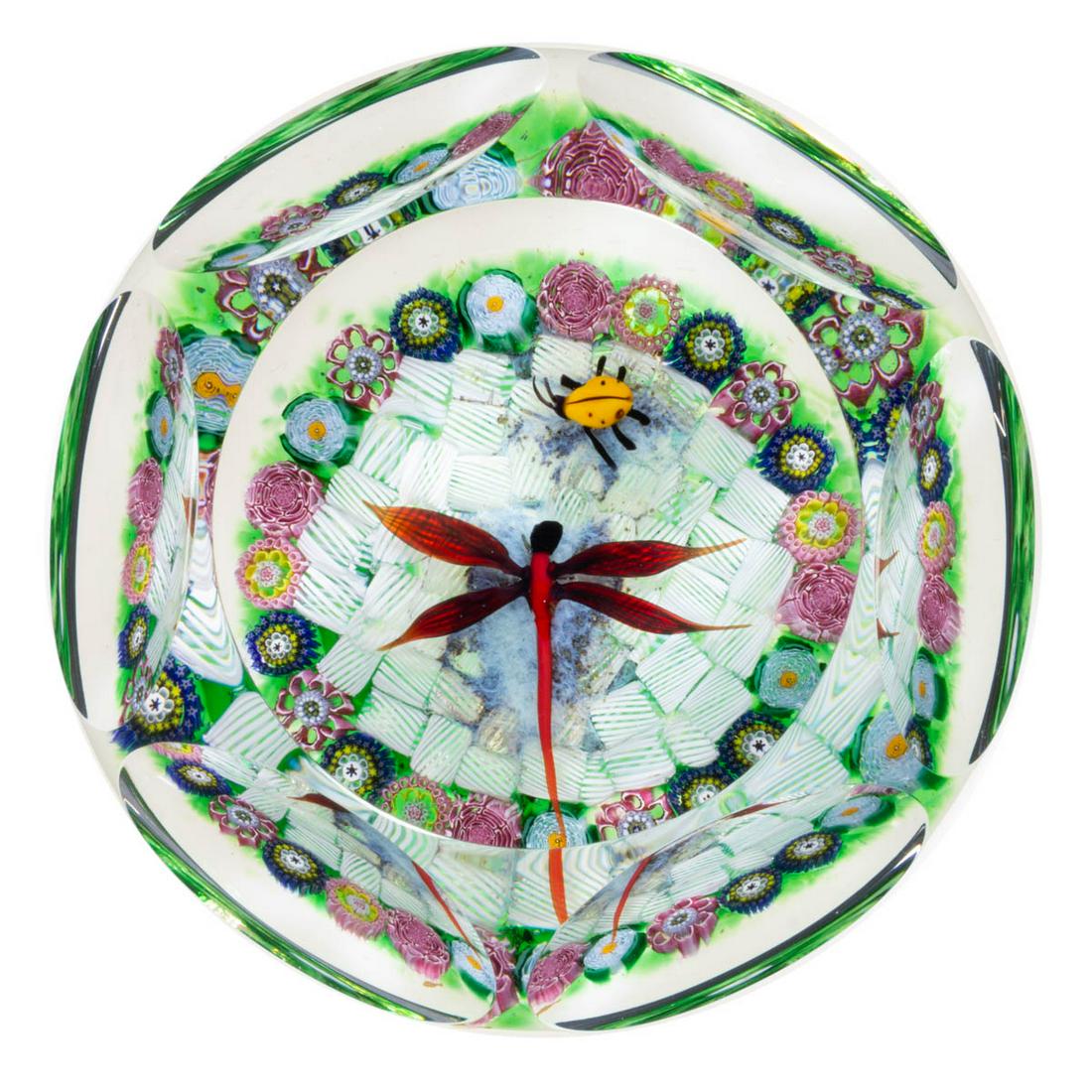 DELMO TARSITANO (AMERICAN, 1921-1991) LADYBUG AND DRAGONFLY LAMPWORK STUDIO ART GLASS PAPERWEIGHT: DELMO TARSITANO (AMERICAN, 1921-1991) LADYBUG AND DRAGONFLY LAMPWORK STUDIO ART GLASS PAPERWEIGHT, cut-faceted with a circular top window, featuring a central red dragonfly looking toward a ladybug, r