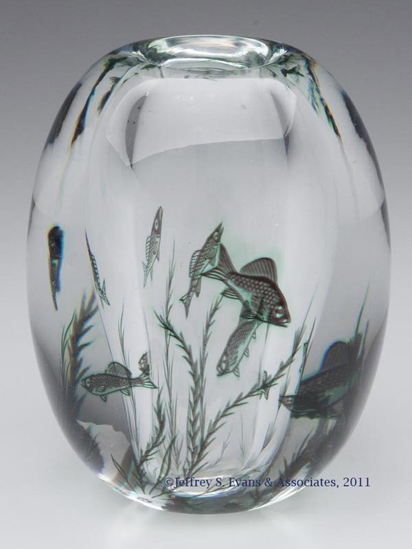 EDWARD HALD FOR ORREFORS GRAAL FISH GLASS VASE: EDWARD HALD FOR ORREFORS GRAAL FISH GLASS VASE, green and black fish and aquatic plants, polished base signed "Orrefors/Sweden/Graal/663H/Edward Hald". Second half 20th century. 5 1/2" H, 4 1/2" DOA. 