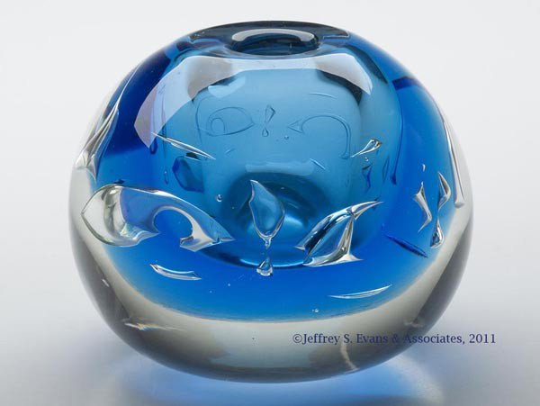 LABINO STUDIO ART GLASS VASE: LABINO STUDIO ART GLASS VASE, cased blue, free-form air-bubble decoration, polished table ring and pontil mark, signed and dated "9-1980". Dominick Labino. 1980. 3 1/2" H, 4 1/2" DOA. Provenance: From