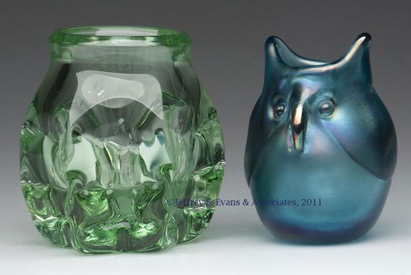 LABINO STUDIO ART GLASS ARTICLES, LOT OF TWO: LABINO STUDIO ART GLASS ARTICLES, LOT OF TWO, comprising an iridized blue owl vase and a transparent green six-pillar quilted vase, each with polished base and pontil mark, signed and dated, the forme