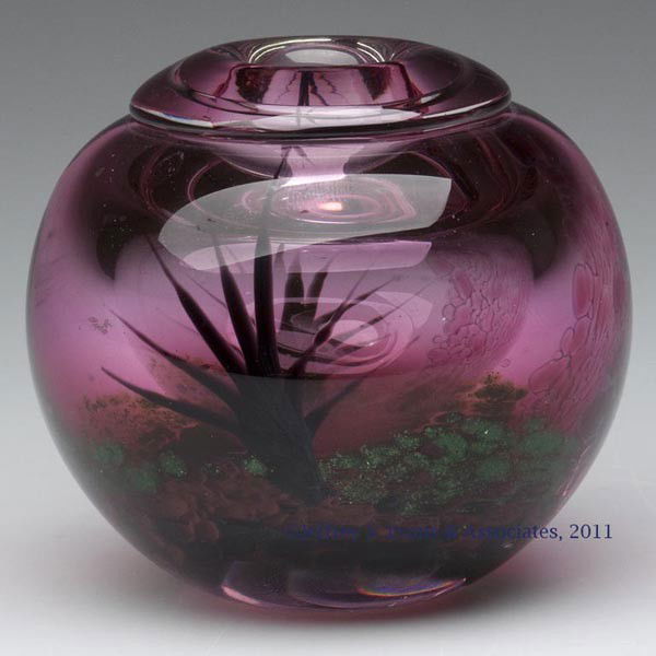 WILLIAM FITZ LIMITED EDITION STUDIO ART GLASS VASE: WILLIAM FITZ LIMITED EDITION STUDIO ART GLASS VASE, transparent magenta, with a stylized cactus-type plant front and back, on a pebbled ground with green mica-fleck decoration, applied collar to openi