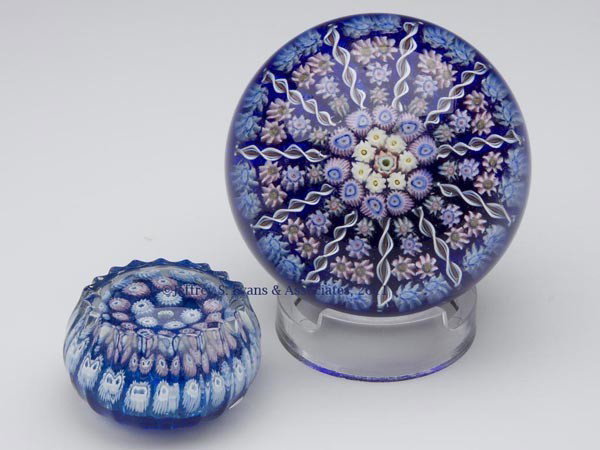 SCOTTISH STUDIO ART GLASS PAPERWEIGHTS, LOT OF TWO: SCOTTISH STUDIO ART GLASS PAPERWEIGHTS, LOT OF TWO, comprising a Perthshire example with complex canes separated by 11 radiating twisted canes, paper label on base; and a John Deacons St. Kilda miniat
