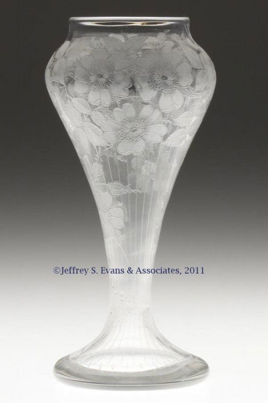 LOCKE ART GLASS WILD ROSE AND LINES PATTERN VASE: LOCKE ART GLASS WILD ROSE AND LINES PATTERN VASE, polished pontil mark, signed "Locke Art" below rim. Locke Art Glassware Co. Late 19th/early 20th century. 7" H, 2 3/8" D rim. Provenance: From the col