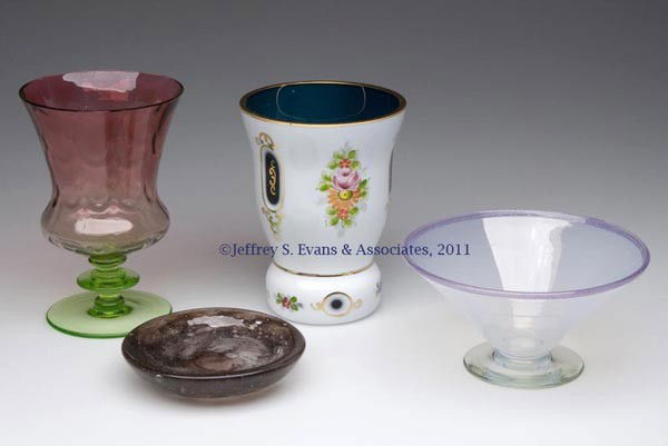 ASSORTED ART GLASS ARTICLES, LOT OF FOUR: ASSORTED ART GLASS ARTICLES, LOT OF FOUR, comprising a polychrome decorated opal to blue cut-overlay tumbler, a rubina and green drape optic small vase, a Cluthra/Cloud Glass type coaster, and a Steub