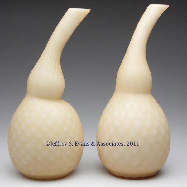 SATIN GLASS PAIR OF VASES: SATIN GLASS PAIR OF VASES, light amber, each diamond quilted gourd form. Probably mid 20th century. 11 7/8" HOA, 5" DOA.