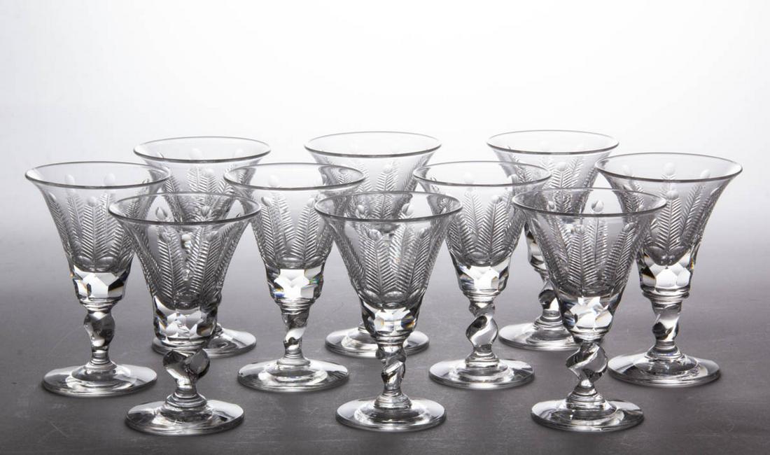 PAIRPOINT ROYAL FERN CUT GLASS COCKTAIL GLASSES, LOT OF TEN: PAIRPOINT ROYAL FERN CUT GLASS COCKTAIL GLASSES, LOT OF TEN, colorless, each with a trumpet-form bowl with eight fern spires, cut-faceted base of bowl, twisted short stems, applied circular feet, poli