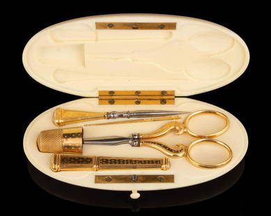 FRENCH 18K YELLOW GOLD SEWING NECESSAIRE / KIT WITH BONE CASE: FRENCH 18K YELLOW GOLD SEWING NECESSAIRE / KIT WITH BONE CASE, oval-form bone case with hinged cover, interior fitted with five tools including four matching patterned tools with a four-dot diamond