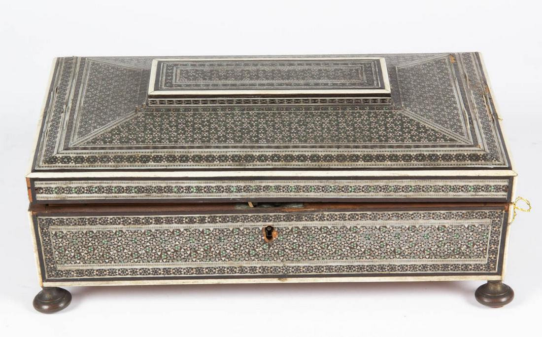 ANGLO INDIAN WOOD WITH SADELI MOSAIC INLAY SEWING BOX / WORK BOX WITH NEEDLEWORKING TOOLS: ANGLO INDIAN WOOD WITH SADELI MOSAIC INLAY SEWING BOX / WORK BOX WITH NEEDLEWORKING TOOLS, rectangular-form box raised on four brass bun feet and metal handles on each side, covered in mosaic marquetr