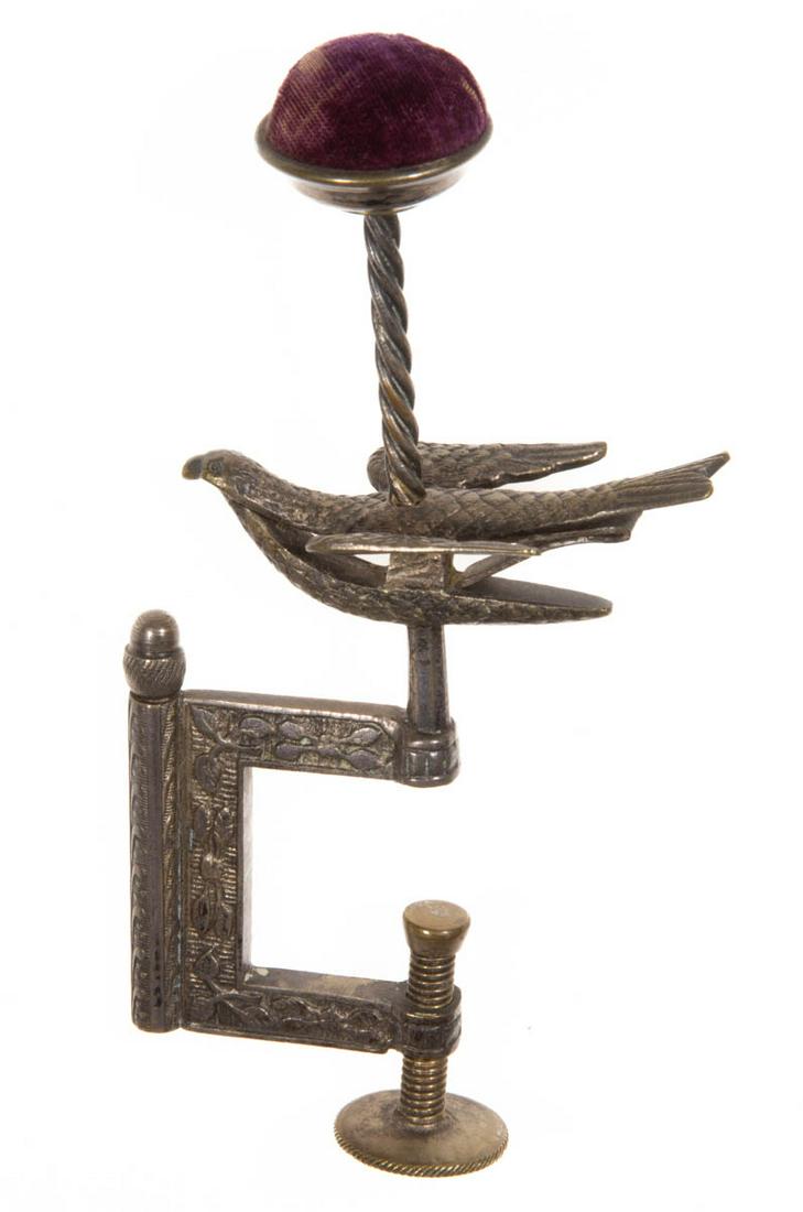 ENGLISH SILVER-PLATED CAST-BRASS AND METAL SEWING BIRD CLAMP WITH NEEDLE CASE (1 of 2)