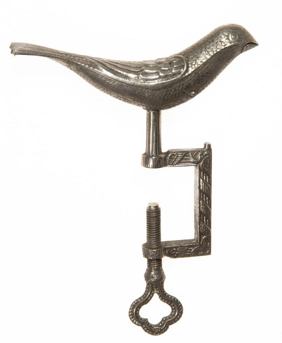 SILVER-PLATED STAMPED AND CAST-METAL FIGURAL SEWING BIRD CLAMP (1 of 2)