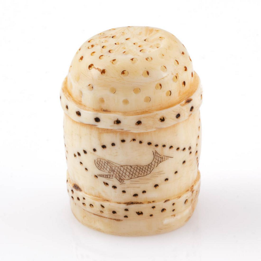 HAND-CARVED AND DECORATED SCRIMSHAW SEWING THIMBLE: HAND-CARVED AND DECORATED SCRIMSHAW SEWING THIMBLE, two raised narrow bands on each side of a decorated band with tinted dots forming diamonds, each diamond with a various object including a whale, sh