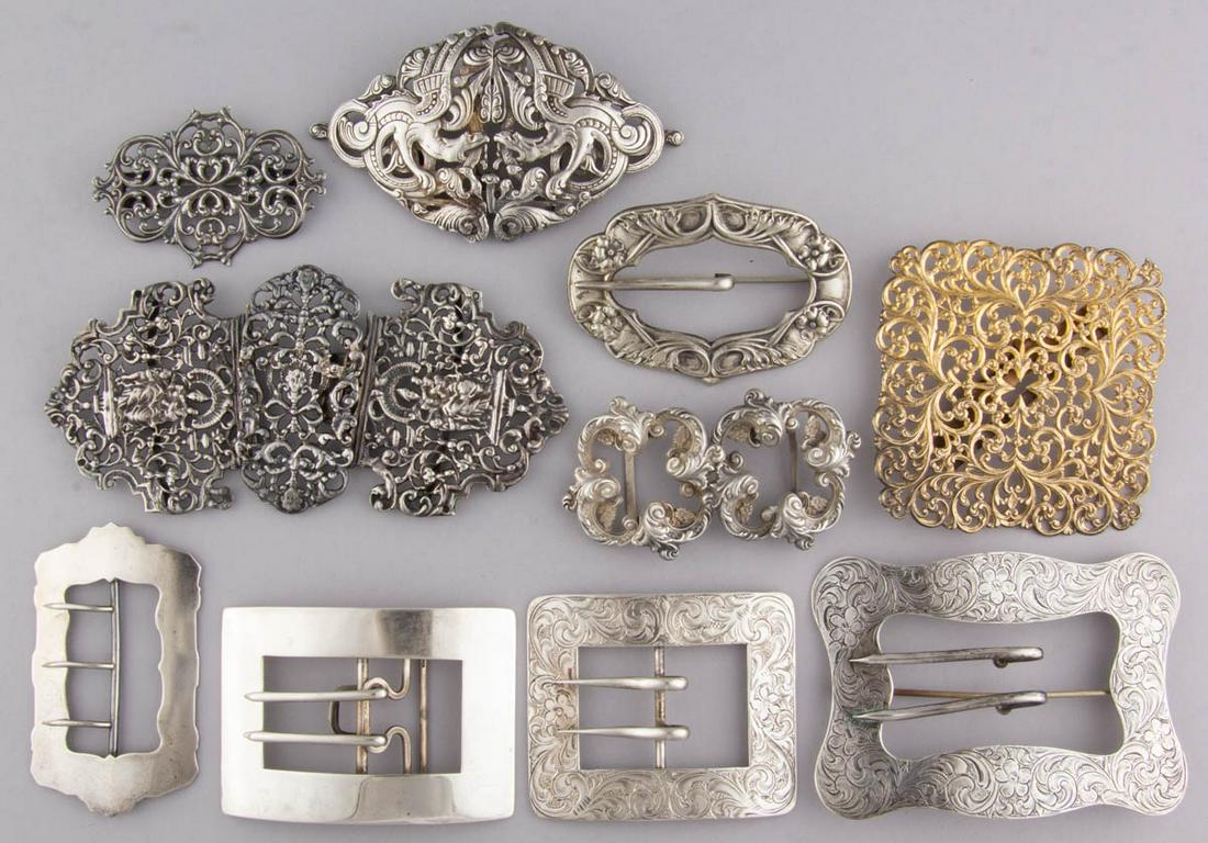 ANTIQUE / VINTAGE STERLING AND OTHER SILVER BUCKLES, LOT OF TEN: ANTIQUE / VINTAGE STERLING AND OTHER SILVER BUCKLES, LOT OF TEN, comprising a German Hanau silver two-part buckle with reticulated design featuring dragon or griffin-type creatures, and nine marked st