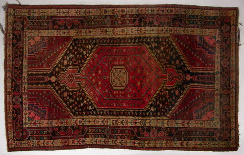 SEMI-ANTIQUE PERSIAN HAMADAN RUNNER / RUG: SEMI-ANTIQUE PERSIAN HAMADAN RUNNER / RUG, red ground, with scattered geometric designs, retaining label to the underside. Late 19th/first half 20th century. 7' 4" x 4' 6".Provenance: From the Bill an