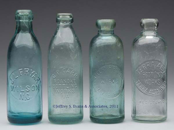 FOUR ASSORTED SOUTHERN SODA BOTTLES: FOUR ASSORTED SOUTHERN SODA BOTTLES, shades of aquamarine, Hutchinson and Matthews styles, comprising J. L. Fryar, Wilson, NC; Excelsior Bottling Works, Clarksburg, WV; Terra Alta Bottling Works, Terr