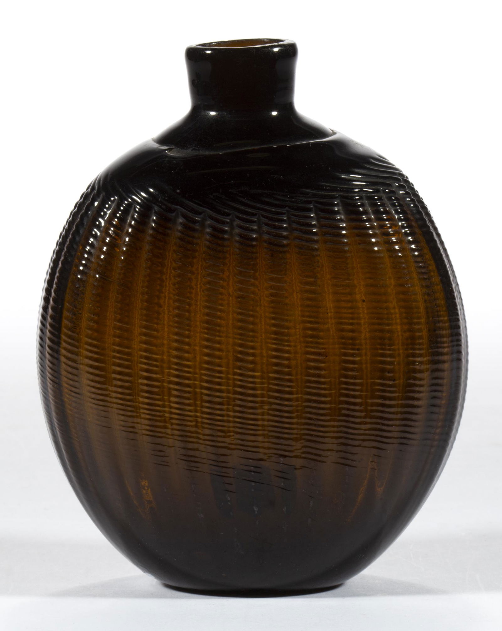 PATTERN-MOLDED HALF-POST PITKIN-TYPE FLASK: PATTERN-MOLDED HALF-POST PITKIN-TYPE FLASK, medium to dark brown amber, approximately one pint, flattened circular form, 36-rib broken-swirl, ribs swirled to the left, short neck with a plain mouth, k