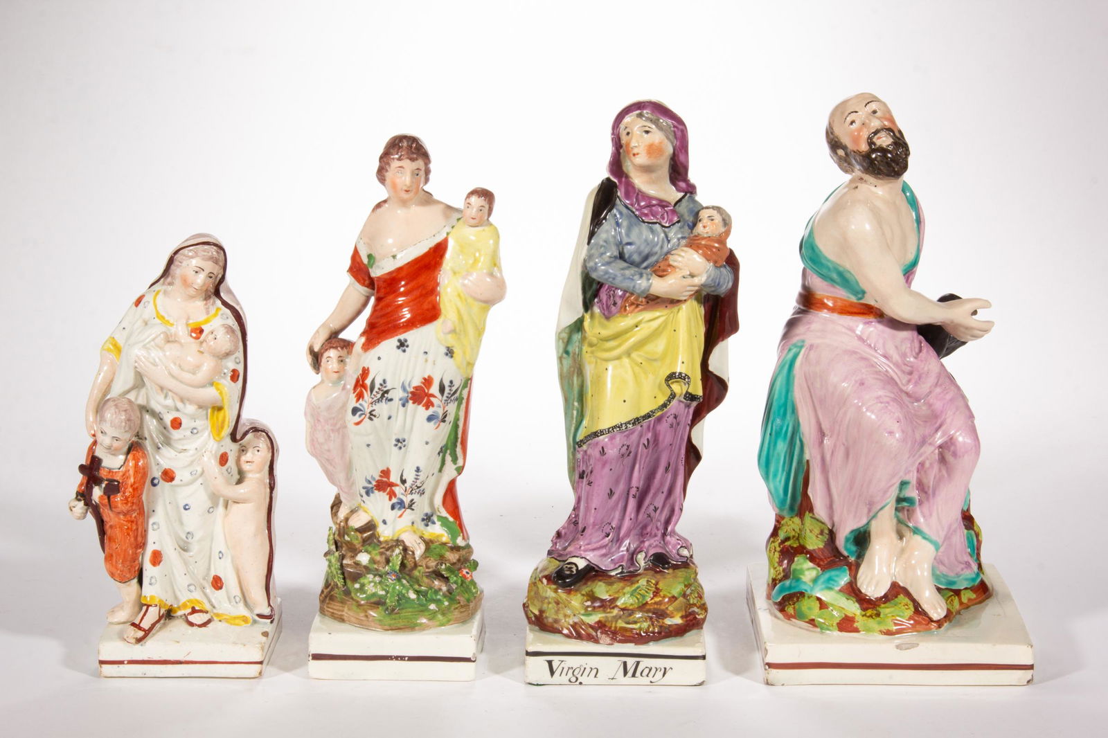 ENGLISH STAFFORDSHIRE RELIGIOUS MOTIF HAND-PAINTED CERAMIC FIGURES, LOT OF FOUR (1 of 5)