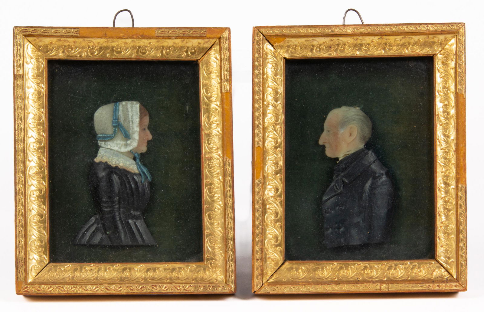 PAIR OF ENGLISH PAINTED WAX MINIATURE PORTRAITS (1 of 2)