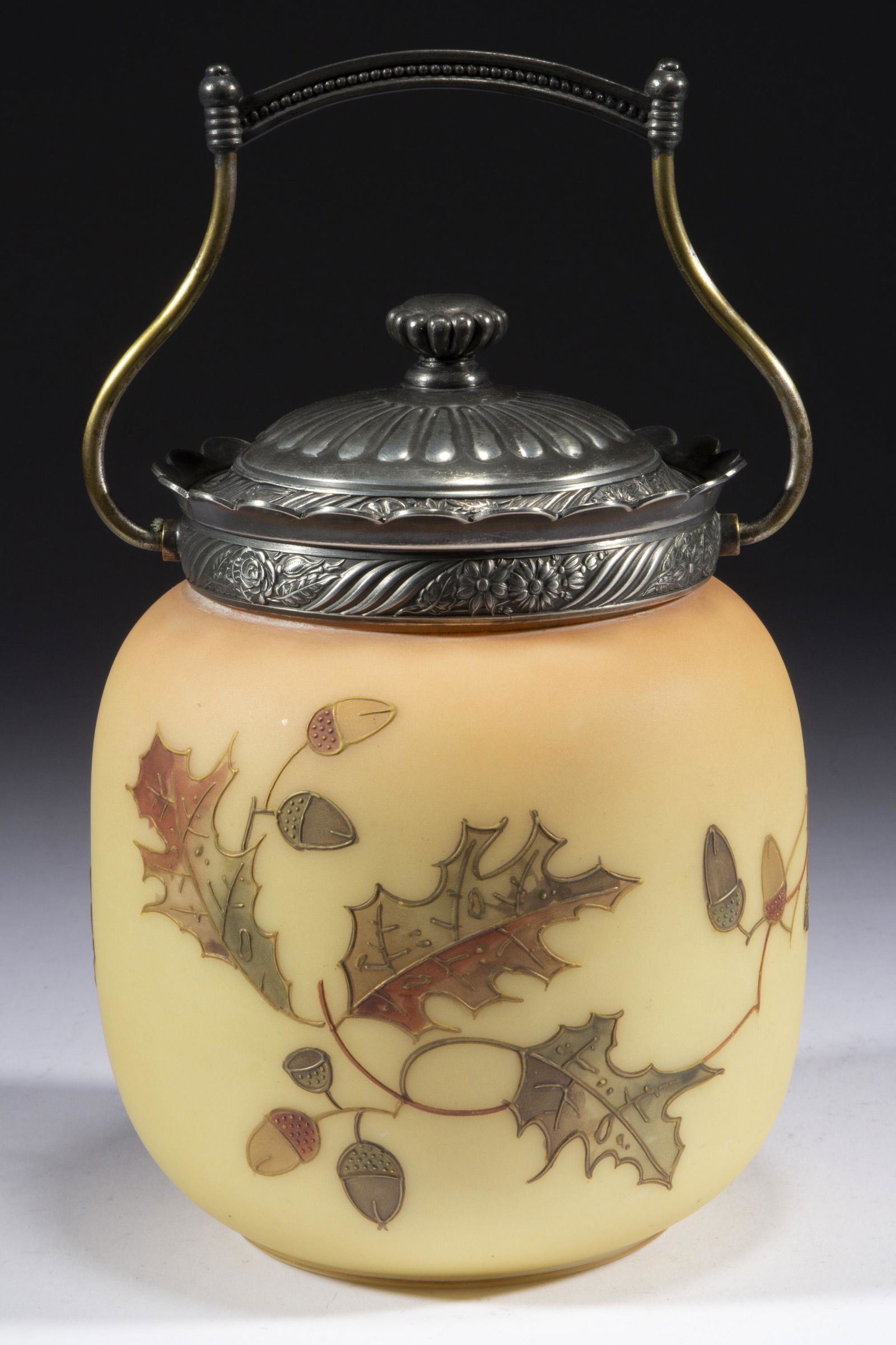 MT. WASHINGTON FIRED-ON BURMESE CRACKER JAR,: MT. WASHINGTON FIRED-ON BURMESE CRACKER JAR, opaque white with a fired-on Burmese ground with polychrome-enamel decoration, ovoid form with Acorns and Oak Leaves decoration, original quadruple-plate m