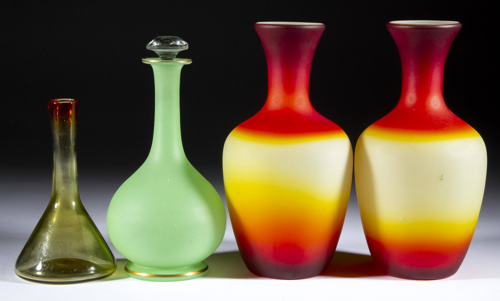 ASSORTED GLASS ARTICLES, LOT OF FOUR,: ASSORTED GLASS ARTICLES, LOT OF FOUR, comprising a pair of Imperial Peachblow vases with a satin finish, a Blenko Tangerine conical vase, and a satin translucent green perfume bottle with a period pre