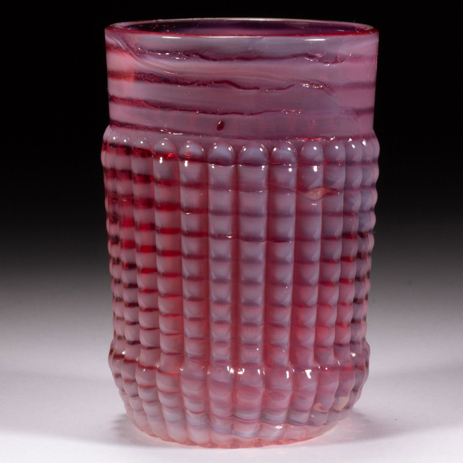 RIBBED OPAL RINGS TUMBLER,: RIBBED OPAL RINGS TUMBLER, cranberry opalescent. Northwood Glass Co. Circa 1888. 3 3/4" H. Literature: Heacock/Elmore - Opalescent Glass From A to Z, p. 175, fig. 893. Provenance: The Dean & Leann Lin