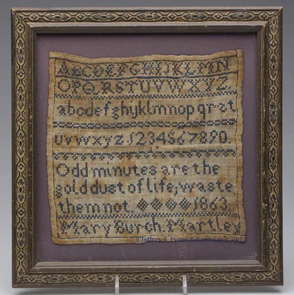 MARY BURCH, 1863 NEEDLEWORK SAMPLER: MARY BURCH, 1863 NEEDLEWORK SAMPLER, silk on linen, four rows of ABCs and numerals above "Odd minutes are the / gold dust of life; waste / them not **** 1863 / Mary Burch. Martley". Modern frame. 1863