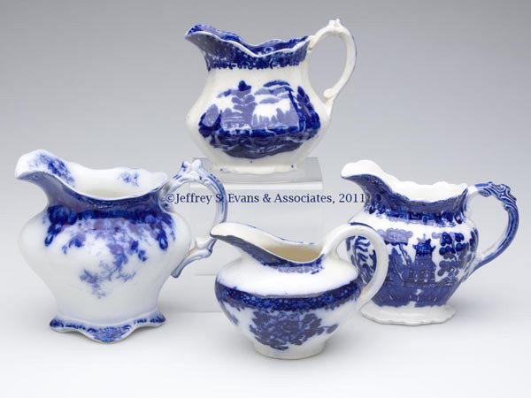 ENGLISH STAFFORDSHIRE TRANSFERWARE FLOW BLUE CREAM: ENGLISH STAFFORDSHIRE TRANSFERWARE FLOW BLUE CREAMERS, LOT OF FOUR, including "WILLOW" by Allerton, and three others, various marks. Late 19th/early 20th century. 3 1/2" to 5" HOA. Provenance: From t